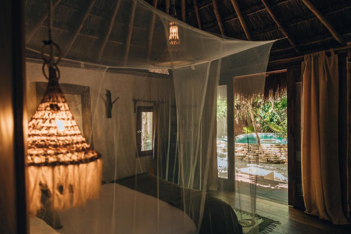 Ikal Tulum Hotel エクステリア 写真 Interior of a bungalow